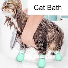 The nail caps come in, like, a million colors. Cat Bathing Anti Scratch Bite Shoes Boots Adjustable Cat Paw Protector For Bathing Shaving Checking Treatment Cat Accessories Cat Grooming Aliexpress