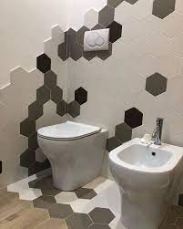 Centro Arredo Ceramiche Bathroom Cladding Made With Hexagonal Porcelain Tiles From The Examatt Collection By Tonal Bathroom Cladding Hexagon Tiles Wall Tiles