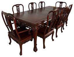 A excellent quality solid pine ducal twin pedastal 6/8 seater extending dining table and six matching chairs original to the table ,the set includes two carvers ,overall. Consigned Vintage Chinese Carved Rosewood Dining Table With 8 Chairs Set Asian Dining Sets By Golden Treasures Antiques And Collectibles Inc Houzz