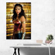 The new poster is as garish as all its predecessors and shows diana prince in a classic superhero pose wearing her new gold armour and brandishing the lasso of. Wonder Woman 1984 Poster Solo 91 5 X 61 Cm Kaufland De