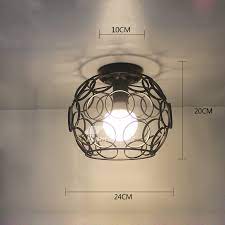The light is black with a brushed on gold color. Kitchen Ceiling Lights Wrought Iron Semi Flush Fixture Black White