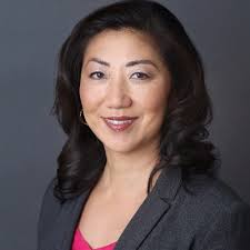 So proud of my "Champion of Justice" award (translation in background  frame) from OCA Asian Pacific Advocates!