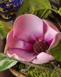 A Close Up Of The Pink Magnolia In Our Magnolia Flower Arrangement In Basket Artificial Flower Arrangements Basket Flower Arrangements Flower Arrangements