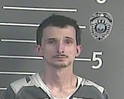 Daniel K. Blankenship**, age 33, of Phelps, KY, was booked into the Pike  County Detention Center