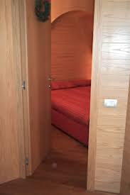 Camera Da Letto Ingresso Appartamento Di Montagna Pozzi Arredamenti Arredamento Camera Da Letto Appartamento