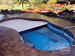 To uncover the pool, turn the crank handle. Automatic Pool Covers Inc Swimming Pool Covers Spokane Wa