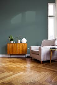 She recommends using artwork that features both hues to tie them together and make the look feel purposeful and polished. Dark Grey Teal Colour Paint Lounge Inspo In 2021 Living Room Paint Blue Paint Living Room Paint Colors For Living Room