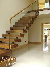 This Staircase Has An Almost Floating Step Effect With Open Rise Steps And Off Set Stringer Support Each Step Modern Staircase Modern Stairs Staircase Design