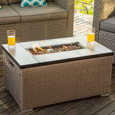 All you need are some scrap lumber and yellow pine wood, 20 bags of lava rock, 80 bags of quickrete, and scrap angle iron. Cosiest Outdoor Propane Fire Pit Rectangle Wicker Fire Table Overstock 31500536