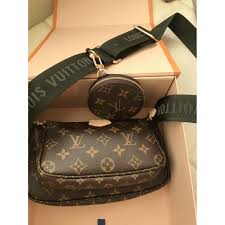 It features a checked blue denim other retailers. Louis Vuitton Handtaschen Aus Leinen Braun 11606575