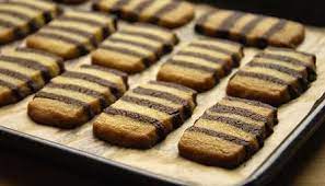 Thebestdessertrecipes is dedicated to the best dessert recipes and baking tips. Chocolate Harlequin Biscuits Yummy Biscuits Biscuit Recipe Delicious Cookie Recipes