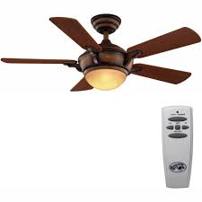 A ceiling fan with remote that is perfect for the room décor, size, and design is not impossible to find if whether you want to install the ceiling fan with remote inside or outside alongside where you live will also remember that not all ceiling fans come with lights. Hampton Bay Midili 44 In Indoor Led Gilded Espresso Dry Rated Ceiling Fan With 5 Reversible Blades Light Kit And Remote Control 68100 The Home Depot