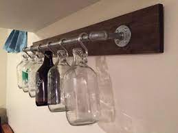 We have a constantly rotating tap list; Rustic Industrial Growler Rack Display Perfect Gift For Craft Beer Lovers Boyfriends Husbands Fathers Etc Beer Room Beer Storage Craft Beer