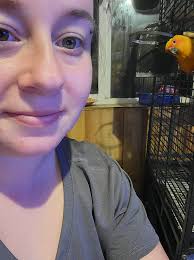 20-25 cm true parrot can't get a good photo of him. Message for details.