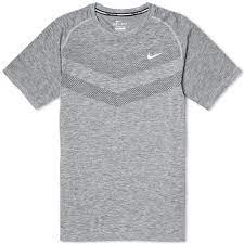The contrast swoosh design trademark is embroidered on the left sleeve. Nike Dri Fit Knit Tee Dark Grey Heather End