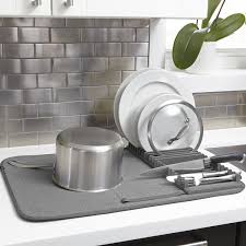 27 Kitchen Products That Ll Save You A Ton Of Space Dish Rack Drying Dish Drying Mat Dish Racks