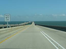 The 23.87 mile long bridge spans 1/1000th of the earth's circumference on its trek between metairie and mandeville. Lake Pontchartrain Causeway Wikipedia