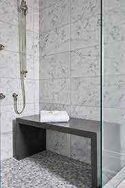 Shower seats and benches are made from different water resistant surfaces that are used for sitting and storage in the shower. Gray Quartz Waterfall Shower Bench Contemporary Bathroom