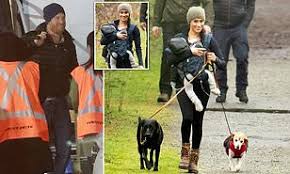 Meghan says as archie smiles, flashing a few teeth. Meghan Markle Carries Archie And Walks Dogs In Vancouver Daily Mail Online