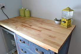 Considering a butcherblock on our island.one of the craft art diy ones. Butcher Block Countertop With Antique Cabinet Base Refresh Living