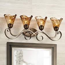 This unconventional lighting style will eliminate those pesky shadows under your chin, cheeks and eyes. 20 Mesmerizing Gold Bathroom Light Fixtures Ideas Under 200