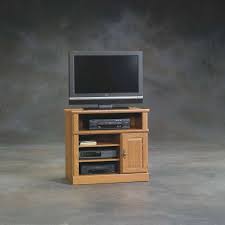 I anchored the small tv stand by using a small wood stool with books and a plant to cover the outlet and cords. Small Tv Cabinet With Wheels Novocom Top