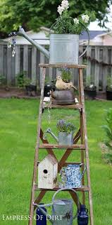20 creative watering can garden art ideas empress of dirt idee deco jardin decor de jardin diy projets de jardins