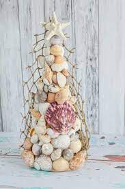 After adding the sand and shells, my diy beach themed christmas ornament was still looking kind of plain. 12 Diy Beach Christmas Decorations That Aren T Ornaments Shelterness