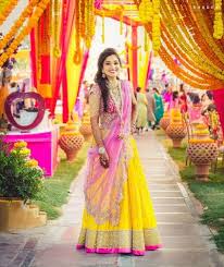 Mehendi Outfits Yellow Lehenga With Pink Detailing Yellow Light Lehenga With Pink Choli And Net Pink Dupatta Indian Bridal Bridal Outfits Bridal Lehenga