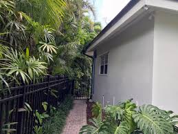 Another combination idea for florida exterior paint colors is white putty, taupe and olive green. Classic White Exterior In Miami Certapro Painters Of Central Miami