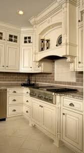 Light Cabinets Light Floor Tan Backsplash Tan Walls Pretty Granite Classic Kitchen Cabinets Antique White Kitchen Home Kitchens