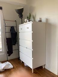 Find a dresser, wardrobe, armoire, or beautiful dresser from ikea tall and narrow with a mirror that flips up on top. Added Legs And Pulls To My Malm For A Lighter Look And So We Could Put It Flush Against The Wall Above The Baseboard Ikeahacks