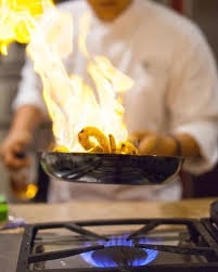 Chef Cooking A Chef Cooking In The Kitchen With Flaming Gas Fire Affiliate Chef Cooking Chef Kitchen Fire Ad Cooking Kitchen Cooking Gas Fires