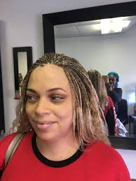 Aisha's hair Braiding