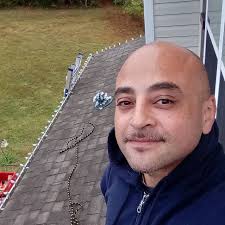 Chevy Chase was all smiles as he posed with Blake Lively and Ryan Reynolds  at Chris Rock's 60th birthday celebration.