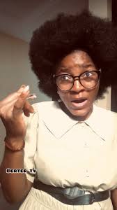 Yellow white eye Zosterops senegalensis. Seen with its classical white eye  ring, yellowish olive above and bright yellow below. Photograph was shot in  Zarazong, Plateau State, Nigeria