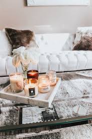 Decorating your coffee table for christmas is super easy! 7 Tips For Styling Your Coffee Table Table Decor Living Room Glass Table Decor Coffee Table Decor Living Room