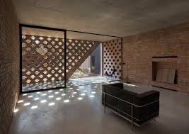 Such decor relieves the object from the effect of an unfinished building. Brick Wall House Design