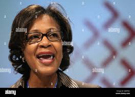 Delegate smiling hi-res stock photography and images