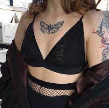 Blackwork Butterfly Tattoo Inked On The Center Of The Chest Http Tattoogrid Net Blackwo Chest Tattoos For Women Chest Tattoo Butterfly Tribal Sleeve Tattoos