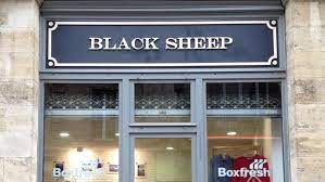 The road signs are bilingual. Black Sheep Store Bordeaux Facebook