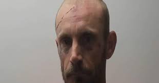 No, his lights weren't on, and, yes, he had drugs in the car