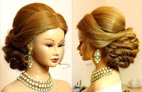 Medium length hair styled with a puff and a bun. Easy Updos For Long Hair Videos Folade