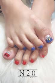 This adorable flower nail art is so easy to do…all you need is comments are closed. Kaws X Sesame Street Nail Art Elmo X Bff Pedicure
