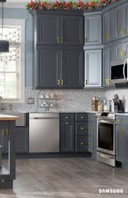 Rustic Meets Modern In This Samsung Kitchen Our Sleek Stainless Steel Appliances Come To Life When Set Rustic Kitchen Cabinets Rustic Kitchen Samsung Kitchen