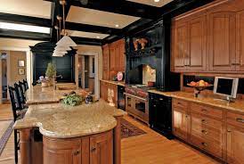 Think plank flooring, rustic cabinetry and crown molding. 10 Kitchens With Black Appliances In Trending Design Ideas For Your Kitchen