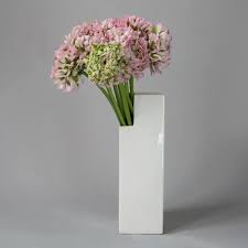 A pink vase with flowers premium vector. Ranunculus Blush Pink In A Modernist Asymmetrical Vase