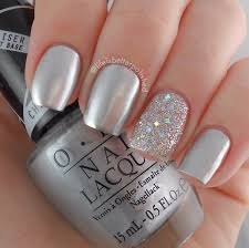 This design uses silver cracked ice to add an incredibly vibrant silver effect to the gel nail art design. Metallic Nails Wedding Nail Art Design Silver Nails