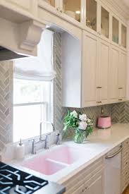 Browse 262 photos of cabinet above sink. How To Run Kitchen Cabinets Across A Low Window The Leslie Style