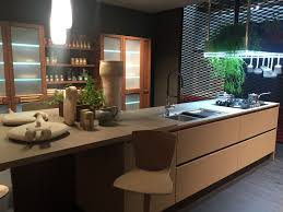 The glossy white finish radiates modern charm. How To Make The Most Of A Bar Height Table